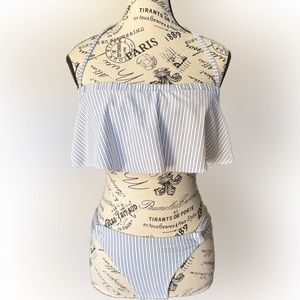 Two piece brand new medium bathing suit with knitted cover up set